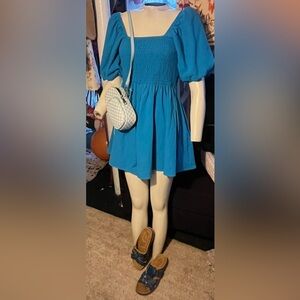 Blue Smocked Dress with Puff Sleeves
3 pieces for 20dollas